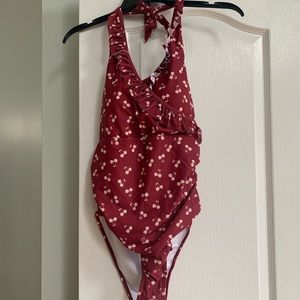 size L, NEVER WORN burgundy patterned one-piece swimsuit